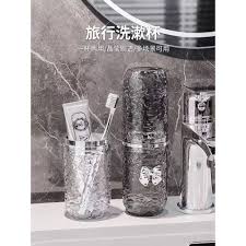 Elegant Travel Toothbrush Cup Set – Textured Dual-Cup Design with Butterfly Emblem